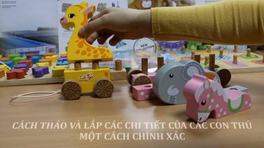 Đồ chơi gỗ xe kéo thú vui nhộn - Wooden pull along train animals shape